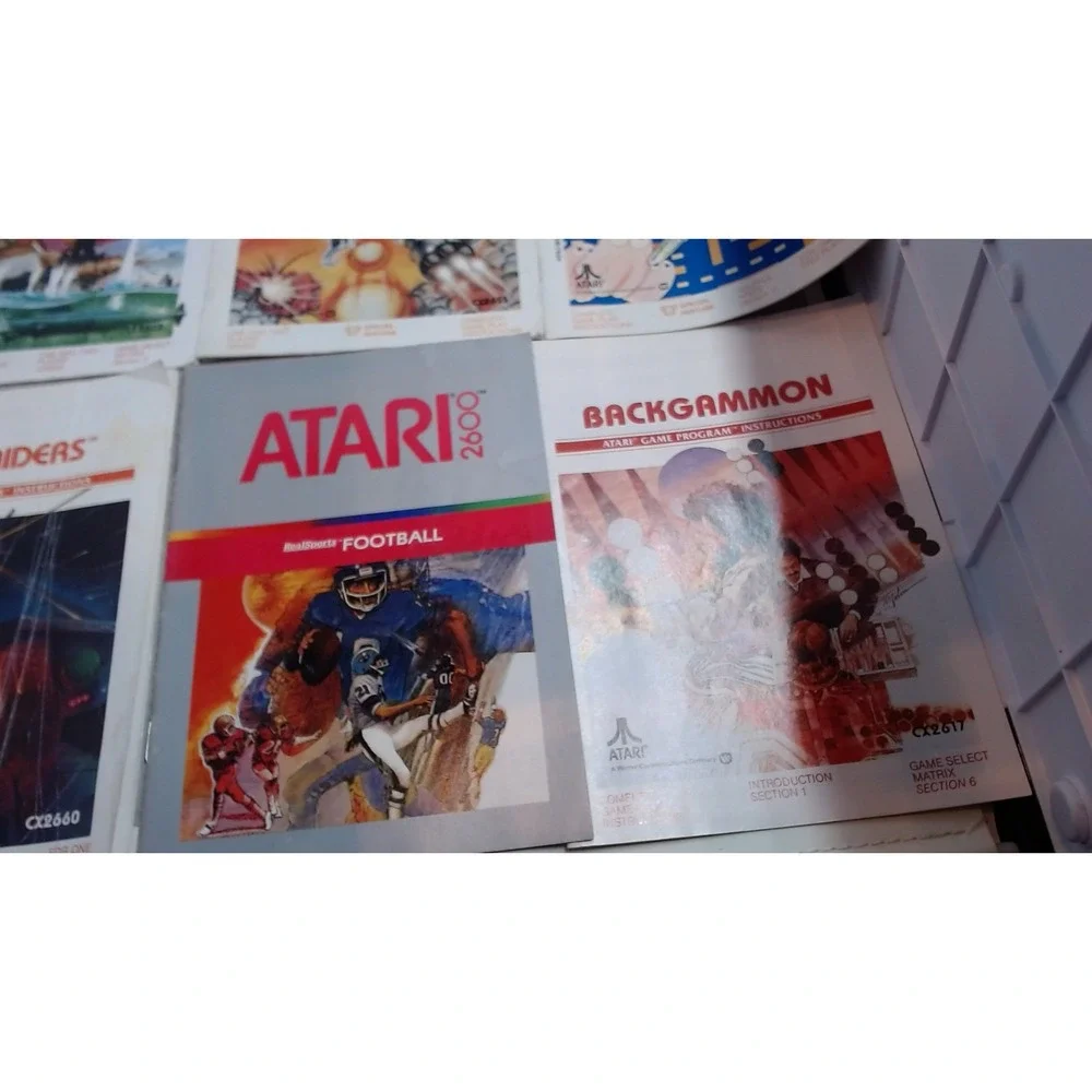 Lot of 7 Atari 2600 Games with Manuals Star Raiders Pac-Man Yars Revenge NTSC